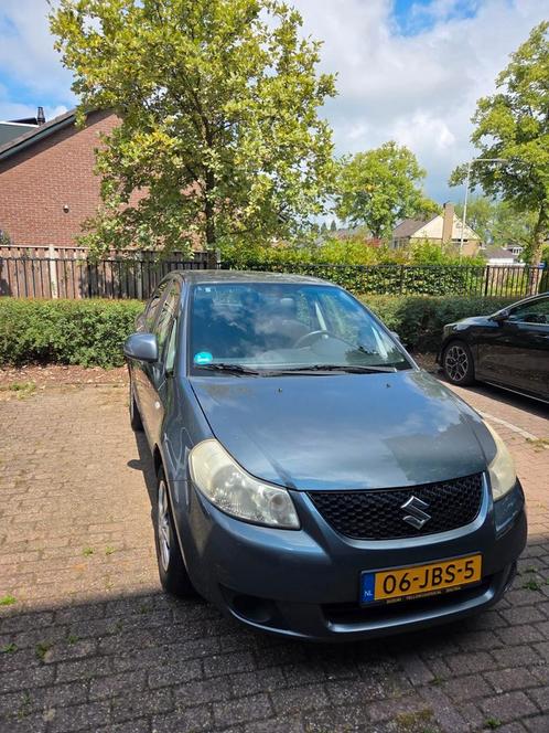 Suzuki SX4 1.6 4DRS 2009 Grijs, Auto's, Suzuki, Particulier, SX4, Airbags, Airconditioning, Bluetooth, Centrale vergrendeling