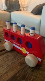 Houten brandweer van Toy Company Plan Toys  als nieuw, Ophalen of Verzenden, Zo goed als nieuw, Rij- of Hobbelspeelgoed