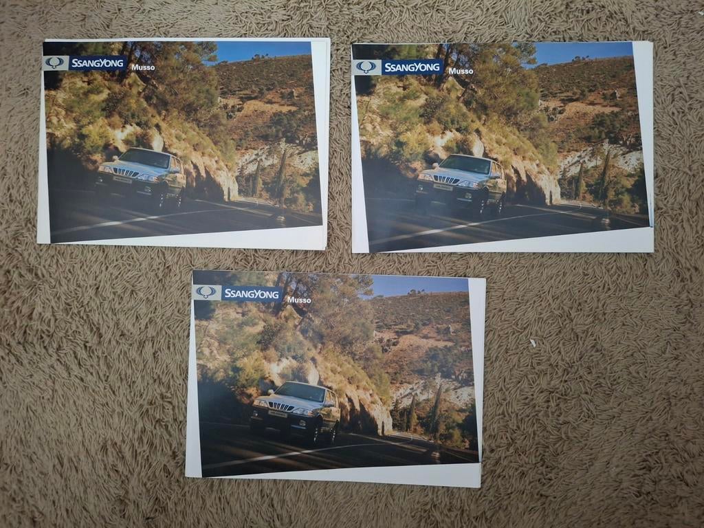 3x autofolder SsangYong Musso facelift, Verzenden, Zo goed als nieuw, Overige merken