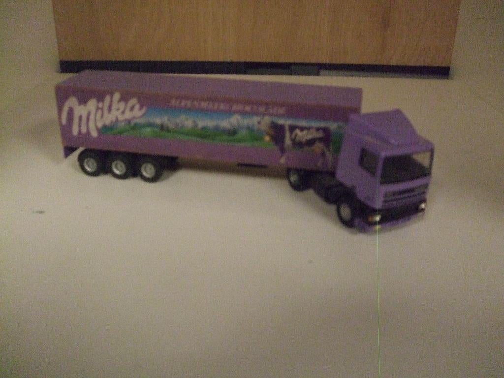 Lion Toys Vrachtwagen DAF Milka, Ophalen of Verzenden, Zo goed als nieuw, Bus of Vrachtwagen, Lion Toys