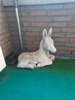 Betonnen beeld van ezel, Ophalen