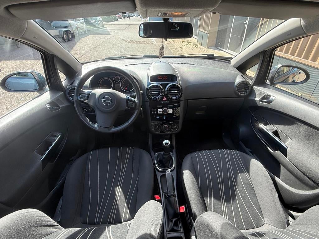 Opel Corsa 1.2-16V '111' Edition cruise Control Airco, Auto's, Voorwielaandrijving, Euro 5, 86 pk, Gebruikt