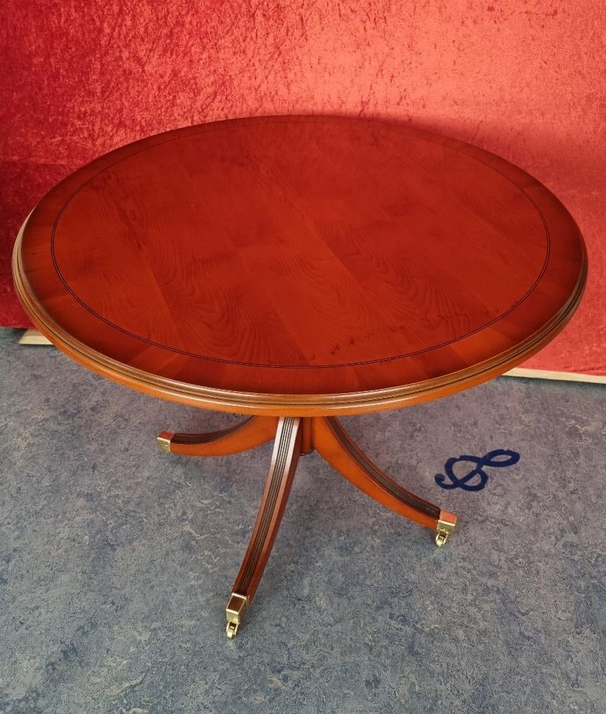 Mahonie salontafel met messing wieltjes, Ophalen, Gebruikt, 100 tot 150 cm, Rond