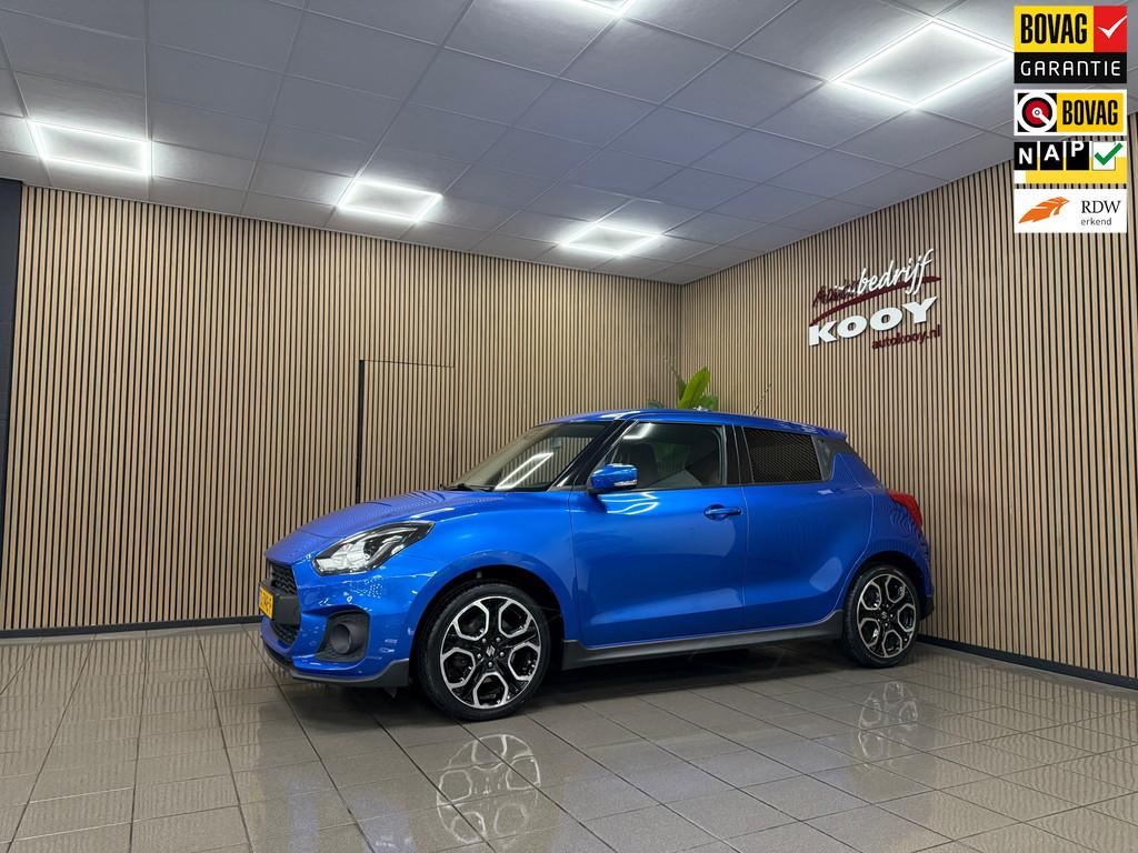 Suzuki Swift 1.4 Sport * Navigatie / LED / Camera / Stoelver, Auto's, Suzuki, Stof, Gebruikt, 4 cilinders, Blauw