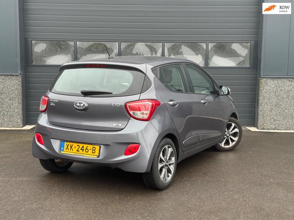 Hyundai I10 1.2i Automaat, Auto's, Hyundai, Euro 5, Gebruikt, 31 €/maand, Leder en Stof