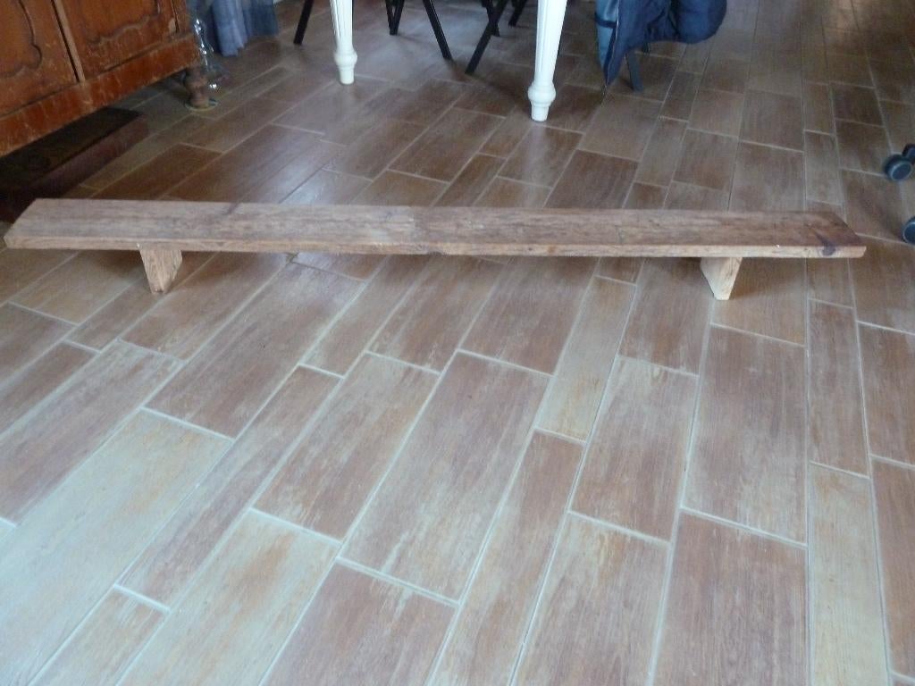 lange lage oude houten bank, Ophalen