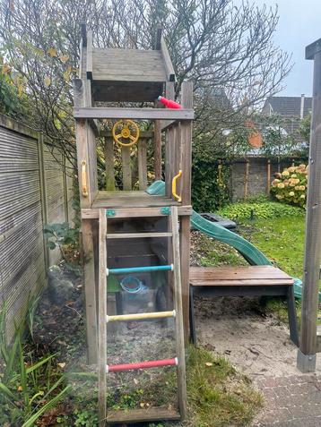 Speelhuis JungleGym met glijbaan beschikbaar voor biedingen