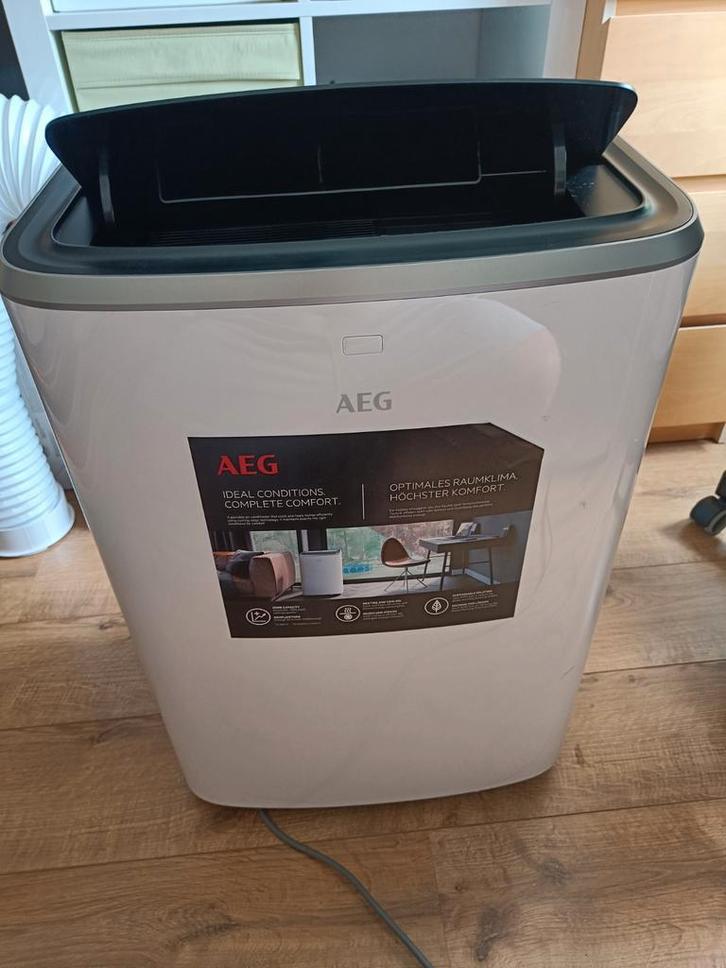 AEG AXP34U338HW + slang, Witgoed en Apparatuur, Airco's, Nieuw, Mobiele airco, Minder dan 60 m³, Energieklasse A of zuiniger, Ophalen