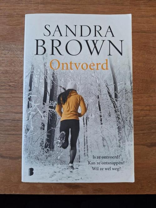 Sandra Brown - Ontvoerd, Boeken, Thrillers, Zo goed als nieuw, Nederland, Ophalen of Verzenden