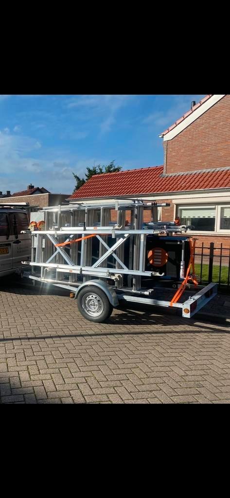 Wienese Steiger + Aanhanger - BTW Vrij!, Doe-het-zelf en Verbouw, Steigers, Gebruikt, Rolsteiger of Kamersteiger, 5 meter of hoger
