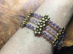 Nieuwe metalen en kristallen armband., Staal, Paars, Ophalen of Verzenden, Zo goed als nieuw