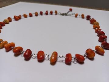 Ketting oranje koraal beschikbaar voor biedingen