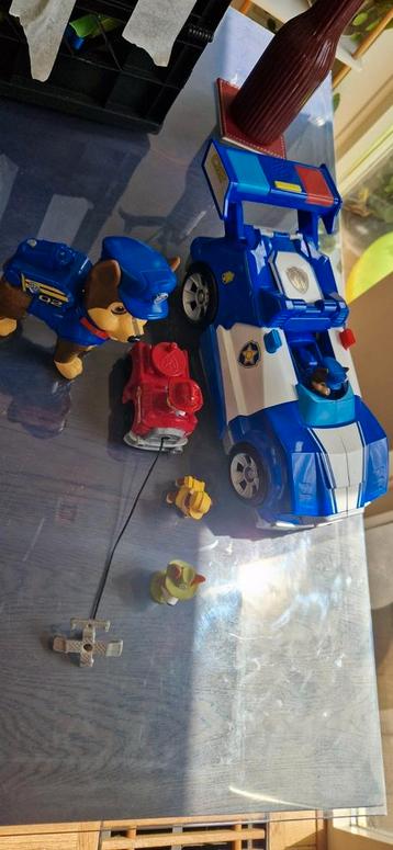 Paw patrol Chase auto met uitschietbare motor en munten  beschikbaar voor biedingen