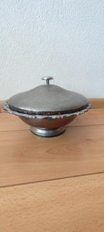 Verzilverde schaal van Oneida, Ophalen