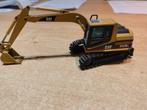 Cat Caterpillar 312BL rupskraan dieplepel nzg 1:50, Hobby en Vrije tijd, Ophalen of Verzenden, Zo goed als nieuw, Hijskraan, Tractor of Landbouw