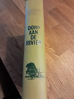 Boek 'Dorp aan de rivier', Boeken, Ophalen of Verzenden, Gelezen