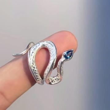 Leuk slag stalen dames ring met blauw zirkoon beschikbaar voor biedingen