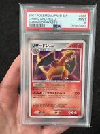 Pokémon PSA 9 Japanse Charizard #6 Shining Darkness, Ophalen of Verzenden, Zo goed als nieuw, Losse kaart, Foil