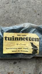 Net voor over de fruitbomen of groenten, Ophalen, Lente