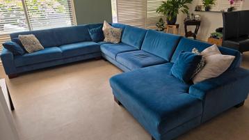 Blauwe velours hoekbank