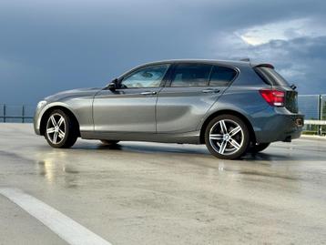 BMW 1-Serie 118d AUT LEER NAVI PRO HIGH EXECUTIVE NL auto beschikbaar voor biedingen