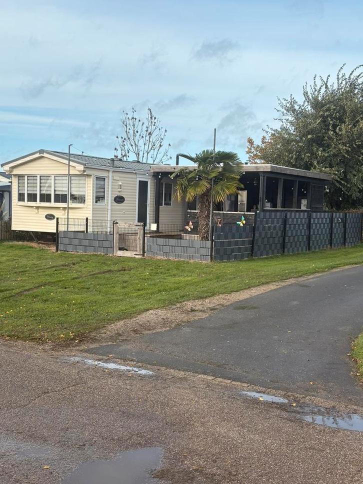 Te koop caravan op het groene eiland  met uitzicht op water, Caravans en Kamperen, Stacaravans, tot en met 2, Ophalen