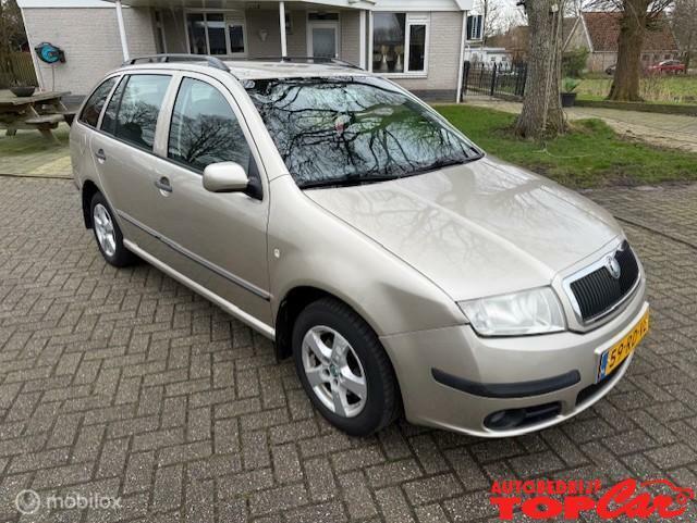 Skoda Fabia Combi 1.4-16V Elegance, Airco, Cruise Apk 9-2026, Auto's, Skoda, Bedrijf, Te koop, Fabia, ABS, Airbags, Airconditioning