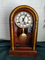 Houten schoorsteenklok, Ophalen