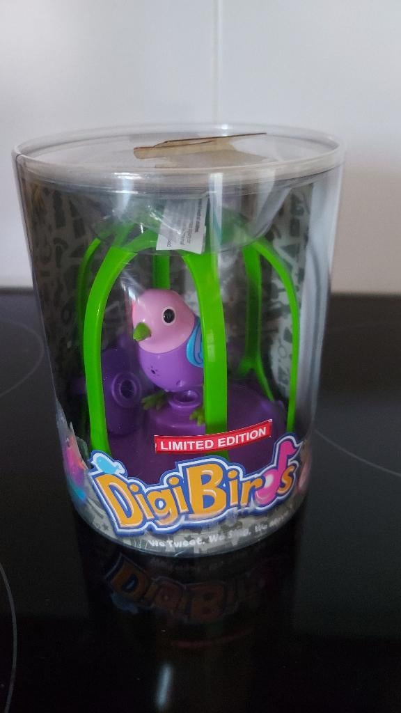 Hema digibird. Vrolijk gekleurd digitaal vogeltje in kooitje, Ophalen, Gebruikt, Jongen of Meisje