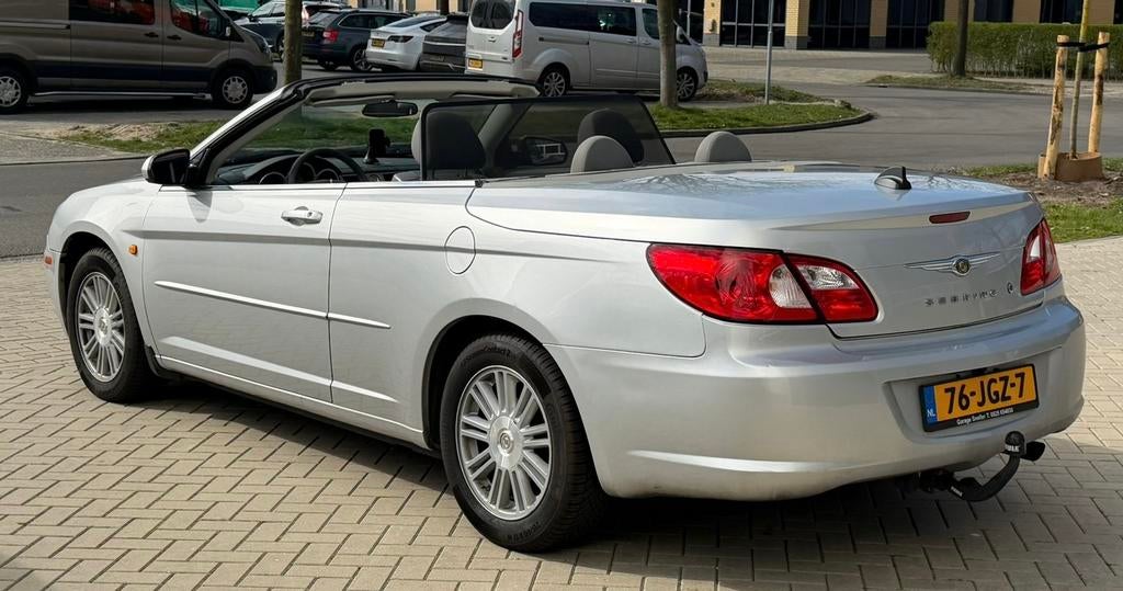 CHRYSLER SEBRING CABRIO 2.7 V6 186PK NIEUWSTAAT CABRIO‼️, Auto's, Chrysler, Automaat, Stof, Zwart, 186 pk