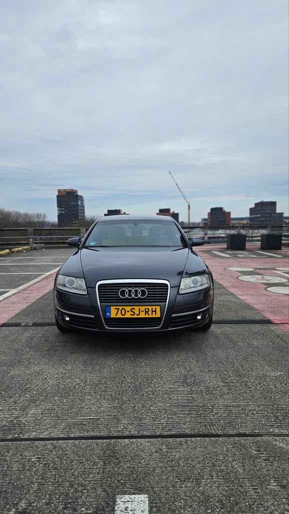 Audi A6 2.4 V6 Multitronic 2006 Grijs, Auto's, Audi, 1800 kg, Beige, Parkeersensor, Zilver of Grijs