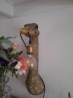 Struisvogel lamp, Ophalen