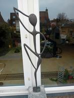 Tuinbeeld op sokkel, Ophalen