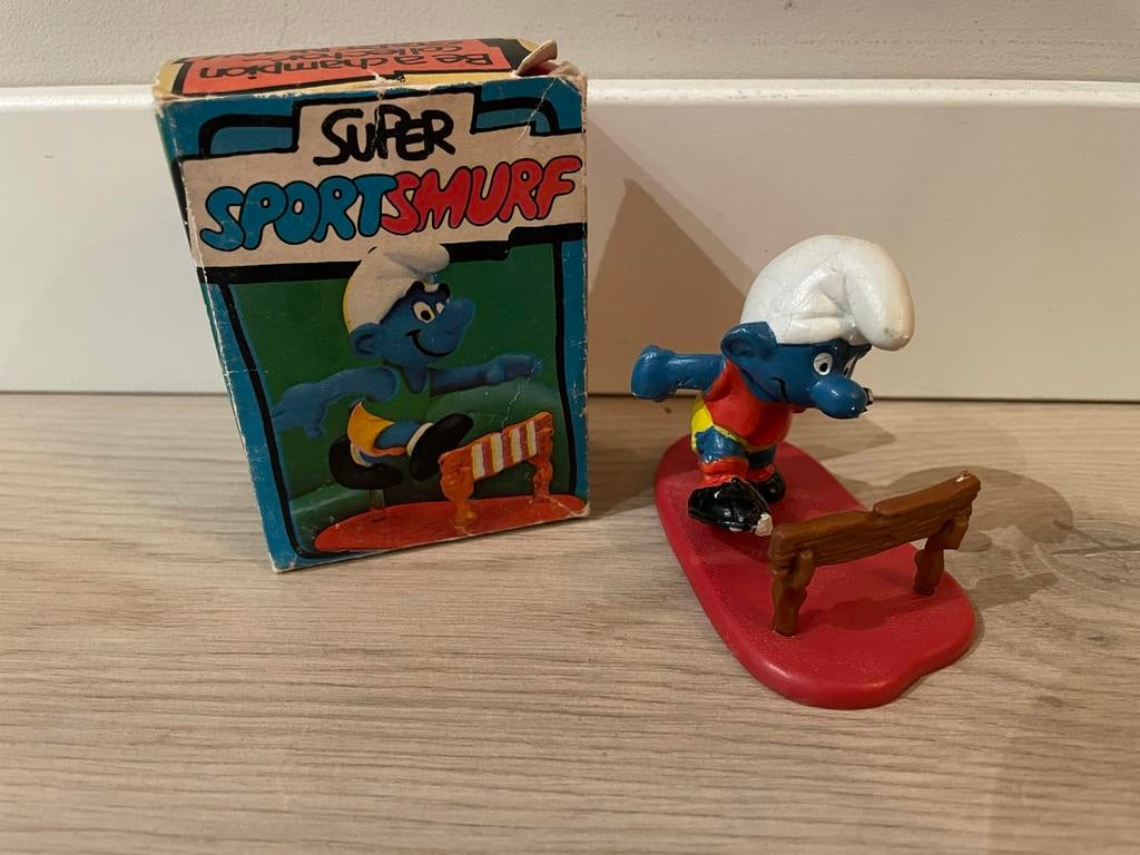 Super Sportsmurf in originele verpakking, Ophalen of Verzenden, Zo goed als nieuw, Overige Smurfen, Poppetje, Figuurtje of Knuffel