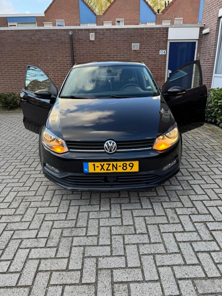 Volkswagen Polo 1.2 TSI 66KW 2014 Zwart, Auto's, Volkswagen, Stof, 40 €/maand, 4 cilinders, Zwart