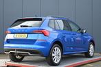 Skoda Kamiq 1.5 TSI ACT Business Edition trekhaak leer autom, Auto's, 4 cilinders, 150 pk, Blauw, Leder en Stof