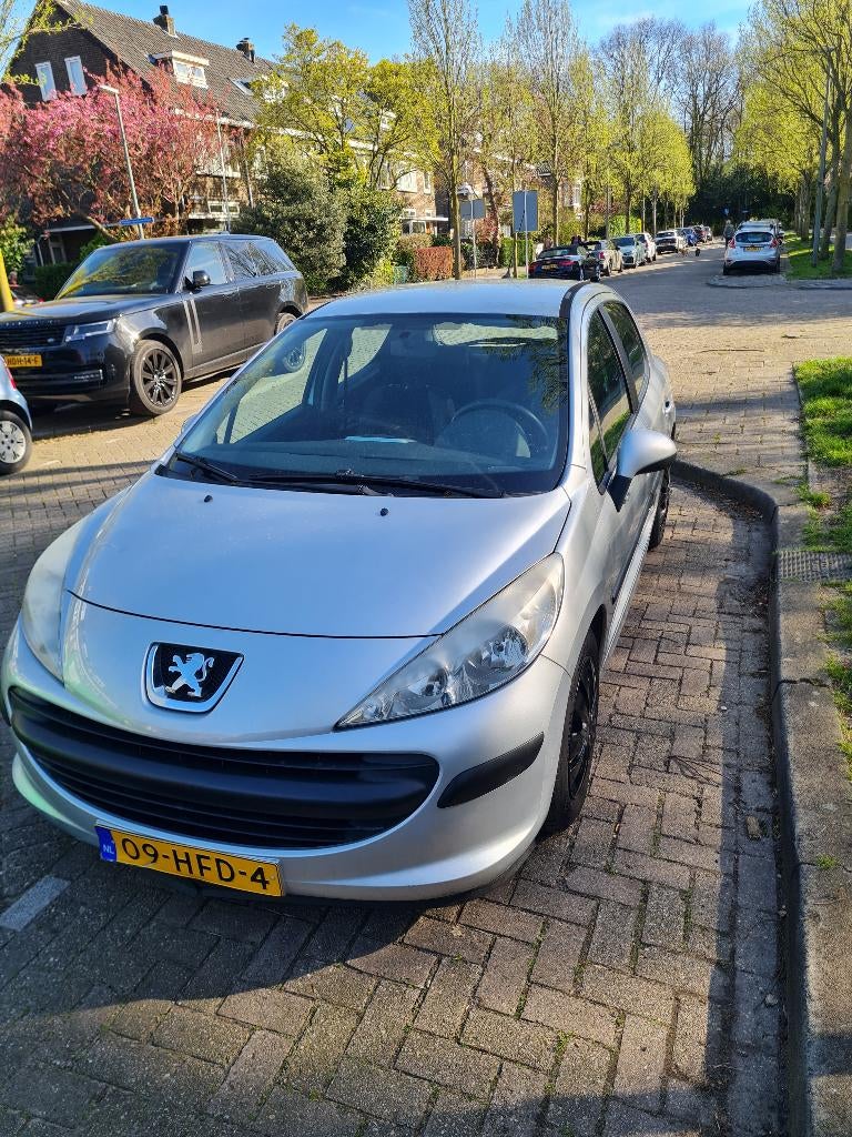 Peugeot 207 1.4 VTI 16V 5DRS 11-2008 Grijs pas 129.767km, Auto's, Peugeot, Stof, Zwart, 1153 kg, Origineel Nederlands