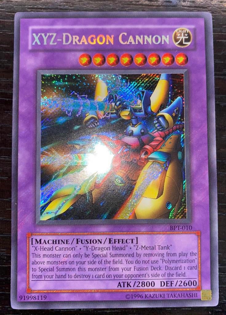 Yu-Gi-Oh! XYZ-Dragon Cannon BPT Old Tim Promo !, Ophalen of Verzenden, Zo goed als nieuw, Losse kaart, Foil