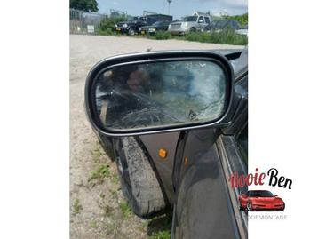 Buitenspiegel links van een Cadillac De Ville beschikbaar voor biedingen