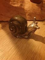 Bronzen Slak van David Ent, Ophalen