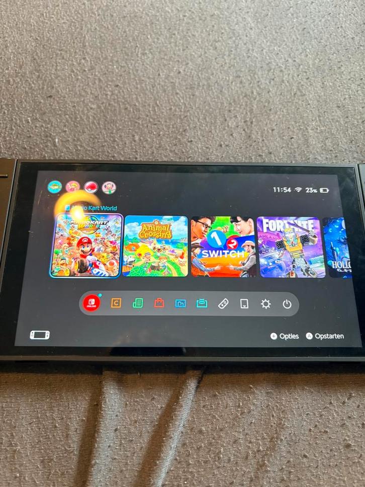 Nintendo switch 2 + 6 spellen, Spelcomputers en Games, Spelcomputers | Nintendo Switch, Zo goed als nieuw, Met 2 controllers, Met games