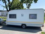 Knaus Sudwind 450 met voortent, luifel en fietsendrager, 75 kg, Omvormbare zithoek, Luifel, Treinzit
