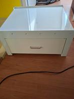 Wasmachineverhoger van metaal, Ophalen