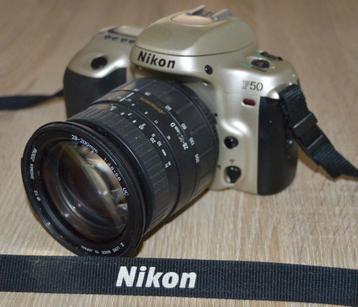 Nikon F50 met Sigma zoomlens beschikbaar voor biedingen