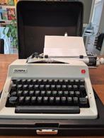 Vintage Olympia typemachine, Ophalen