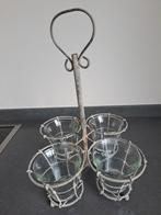 Rek met glaasjes voor plantjes, Ophalen