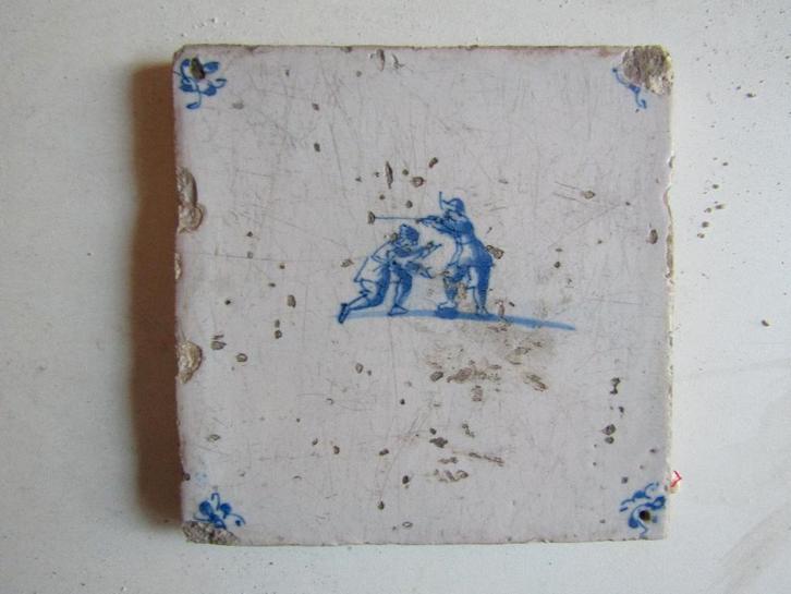 een 17e eeuwse tegel met een kinderspelletje, Antiek en Kunst, Antiek | Wandborden en Tegels, Ophalen of Verzenden