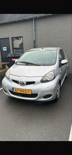 Toyota Aygo 1.0 12V Vvt-i 5DRS 2009 Grijs, Auto's, Voorwielaandrijving, 4 stoelen, 68 pk, Origineel Nederlands