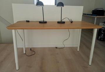 In hoogte verstelbaar bureau, (werk)tafel: 1.40m x 0.65m