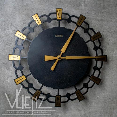 Vintage, Mid Century metalen klok zonneklok Elektrik Hettich, Huis en Inrichting, Woonaccessoires | Klokken, Gebruikt, Wandklok